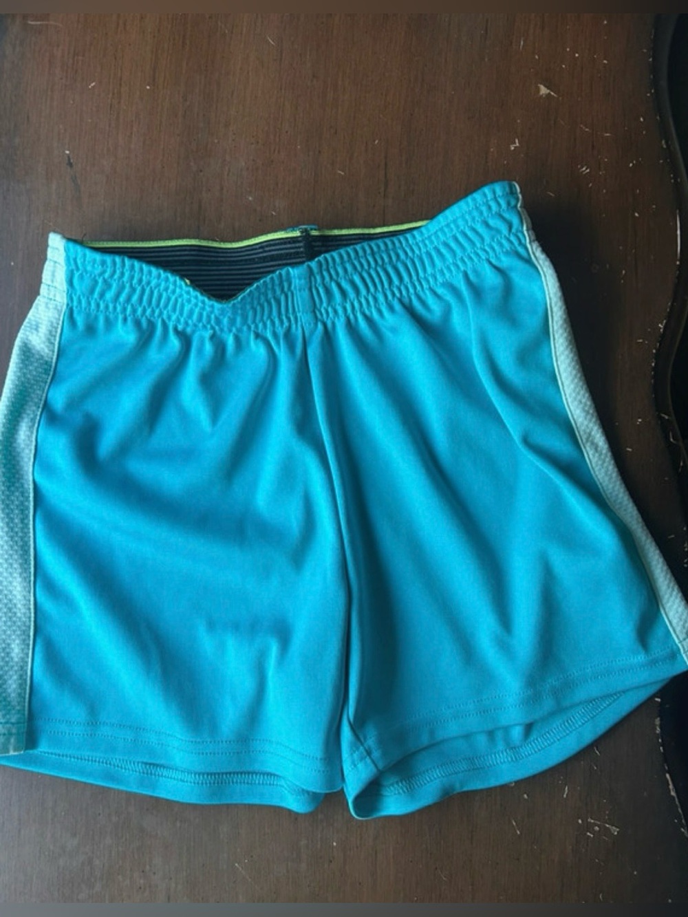 Champion Teal Athletic Shorts with Black Waistband and Light Blue Trim